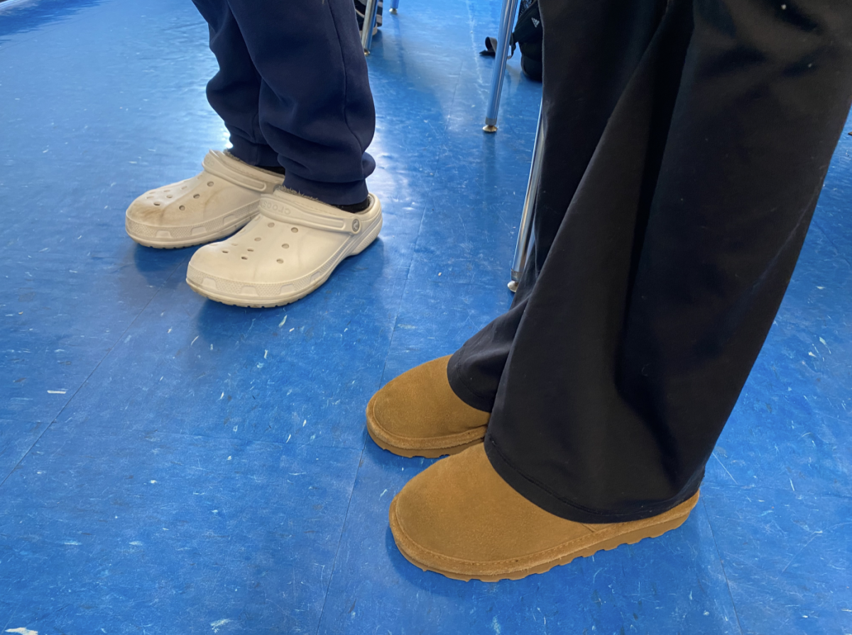 Students in NHP Memorial model popular winter footwear options such as Uggs and Crocs.